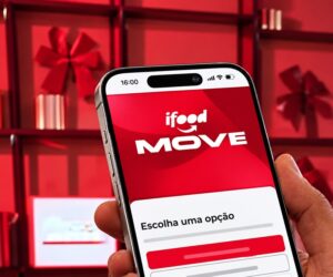 Foto de um celular com o logo do iFood Move